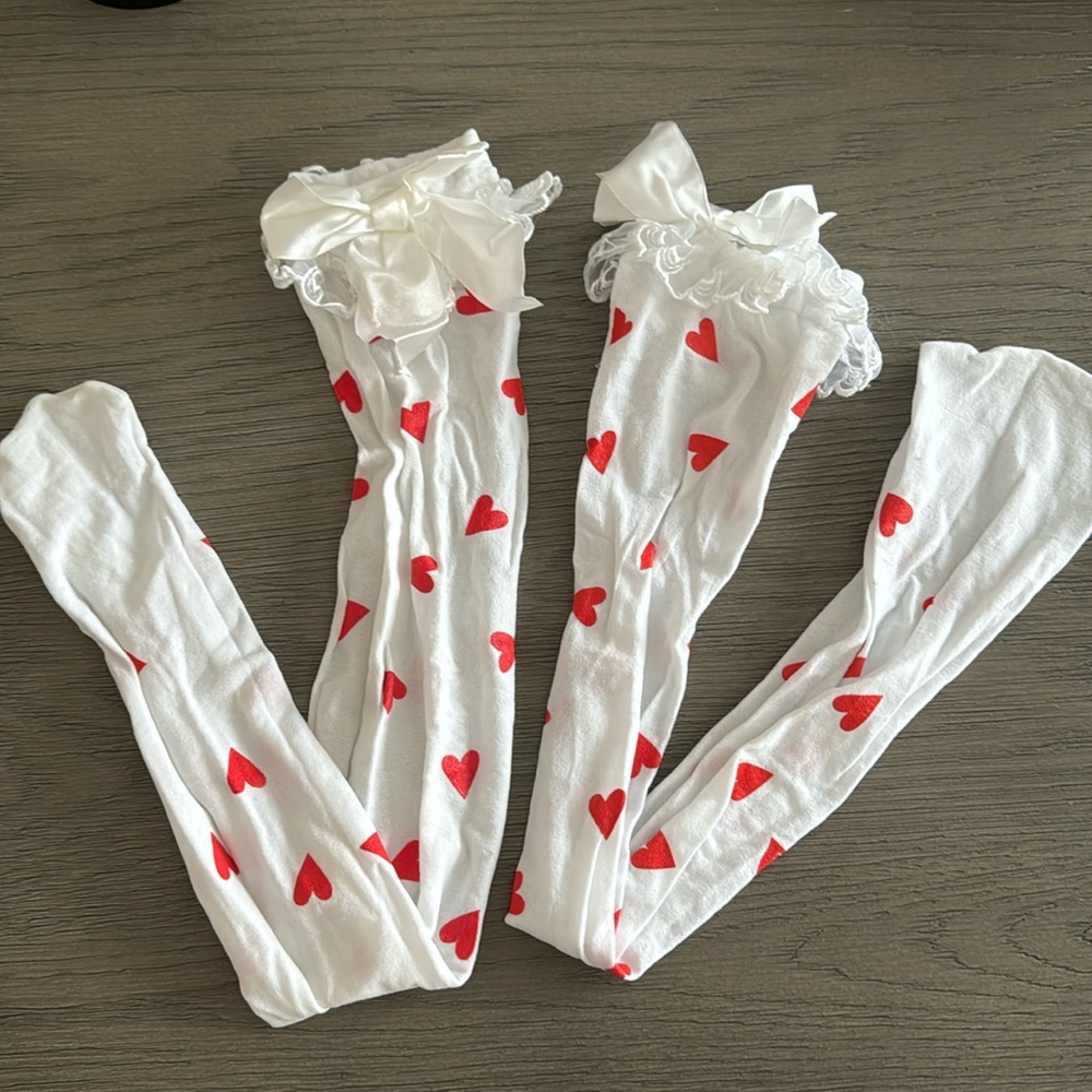 Adorable thigh high stocking with hearts, lace and ribbon. Size Small